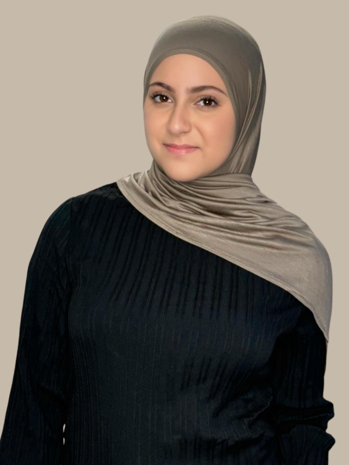 Sandstone Pre-Sewn Jersey Hijab in Modish Girl size, front view on model with hijab draped over shoulder showing smooth fit and soft stretch fabric.