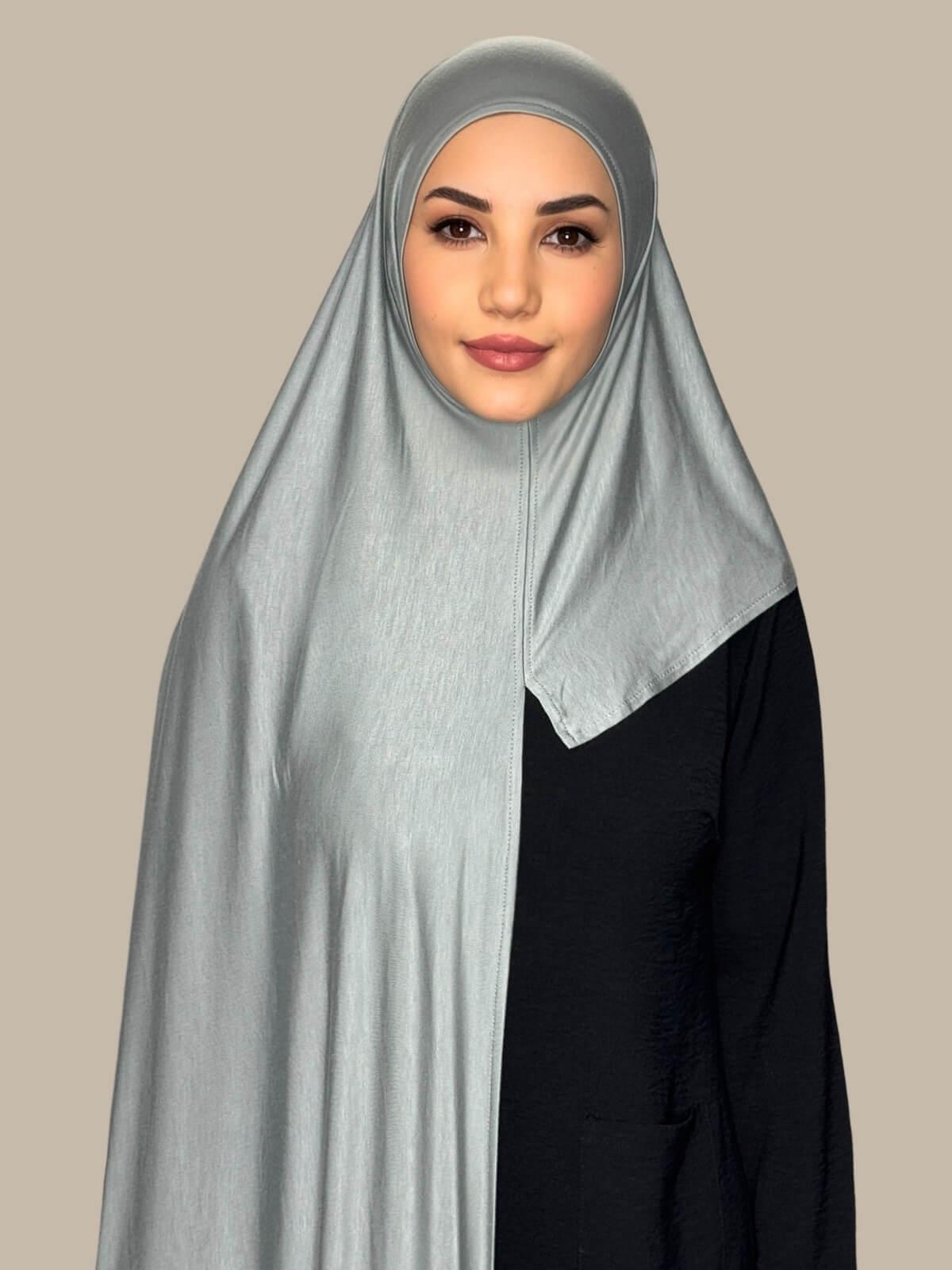 Stone Green Pre-Sewn Jersey Hijab front view on model showing full coverage and smooth drape on both sides.