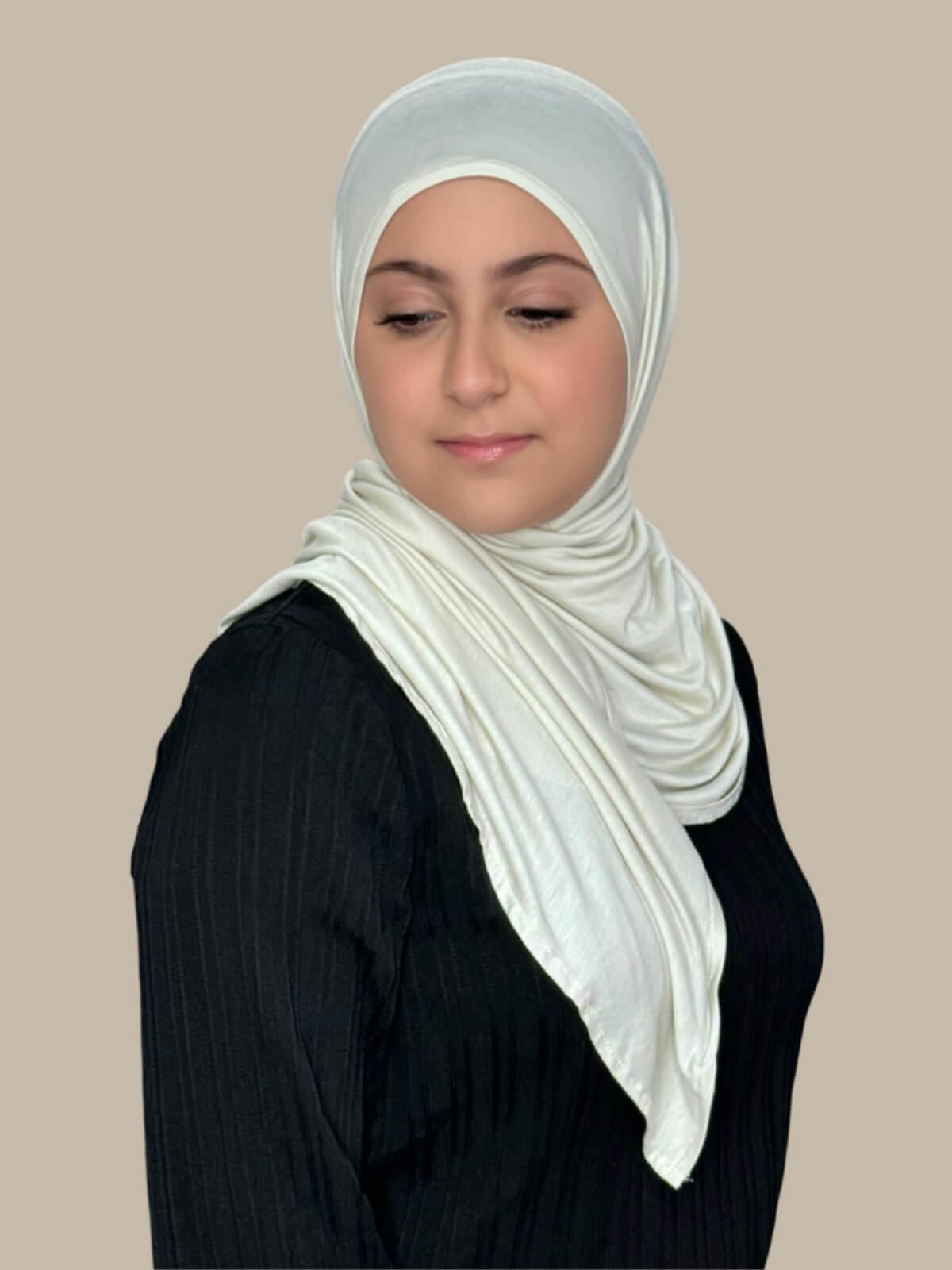 Ivory Pre-Sewn Jersey Hijab in Modish Girl size, side view on model with hijab wrapped neatly around shoulders showing smooth fit and soft stretch fabric.