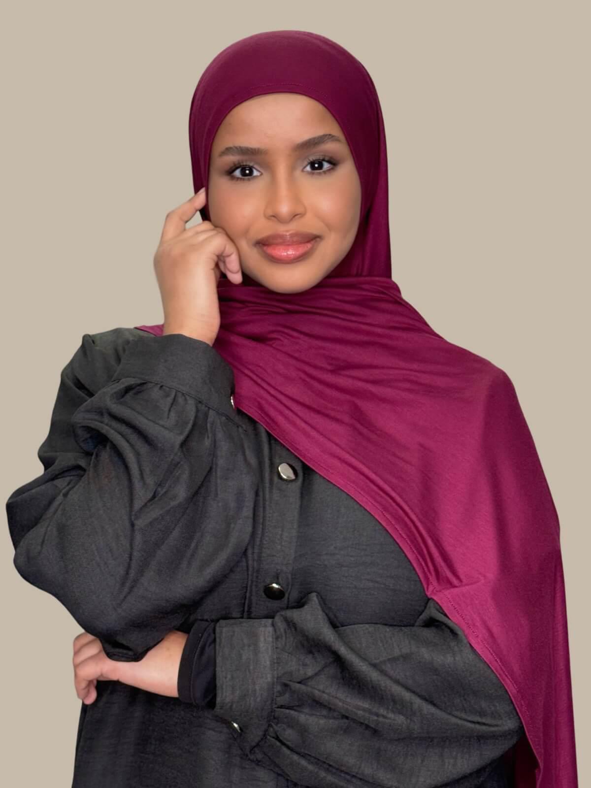 Burgundy Pre-Sewn Jersey Hijab front view on model draped over the shoulder no pins