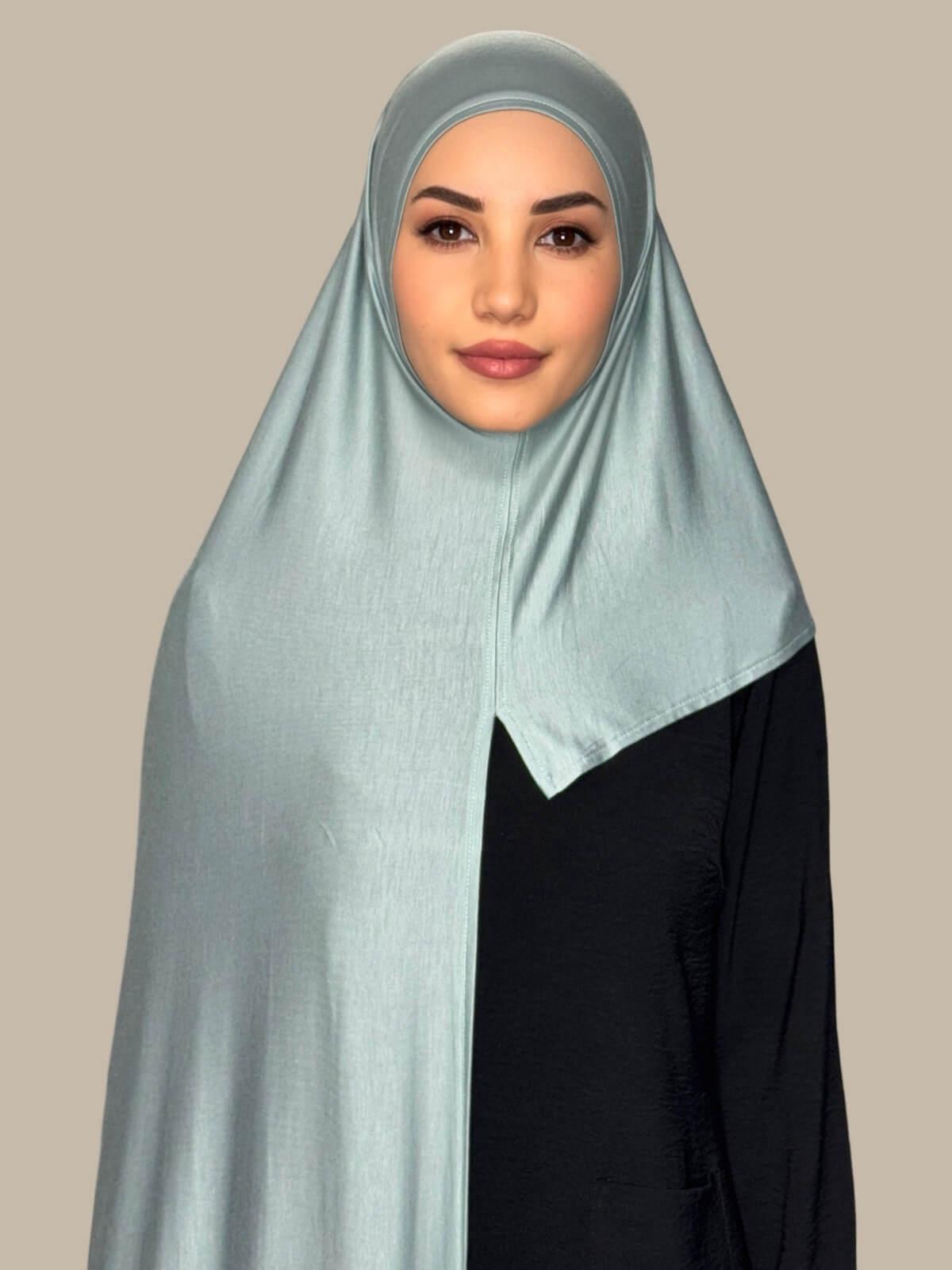 Pale Cyan Pre-Sewn Jersey Hijab front view on model showing full coverage and smooth drape on both sides.