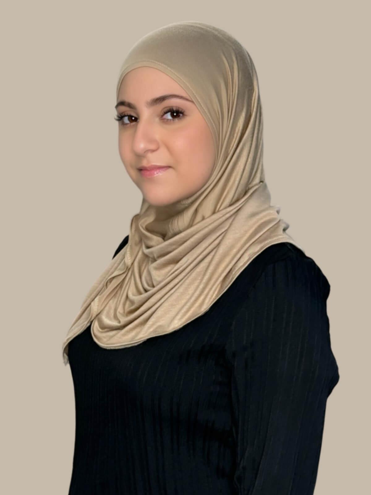 Oak Pre-Sewn Jersey Hijab in Modish Girl size, side view on model with hijab wrapped neatly around shoulders showing smooth fit and soft stretch fabric.