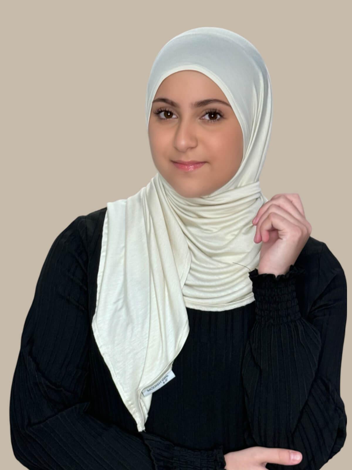 Ivory Pre-Sewn Jersey Hijab in Modish Girl size, front view on model with hijab wrapped neatly around shoulders showing smooth fit and soft stretch fabric.