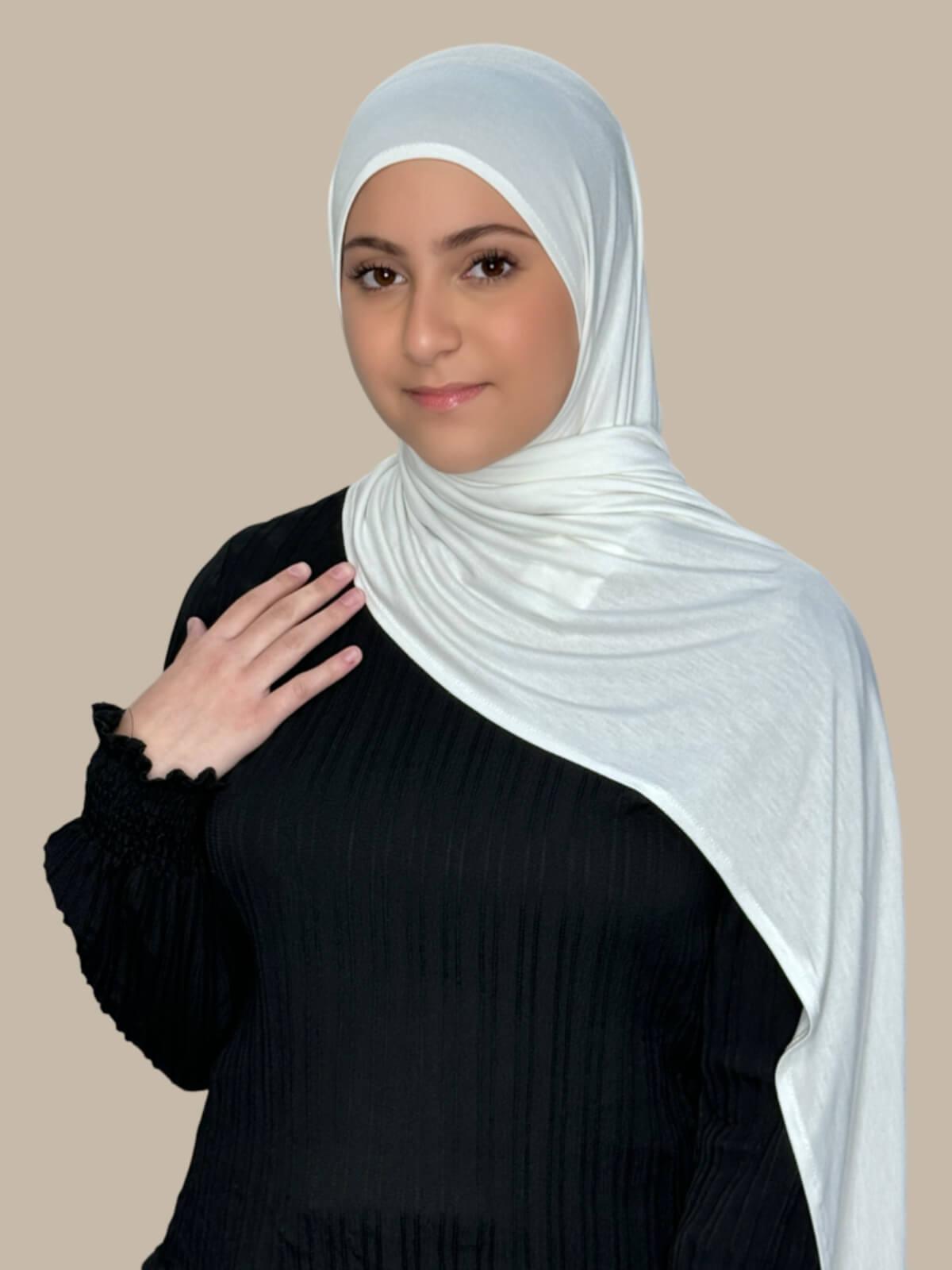 Off White Pre-Sewn Jersey Hijab in Modish Girl size, front view on model with hijab draped over shoulder showing smooth fit and soft stretch fabric.