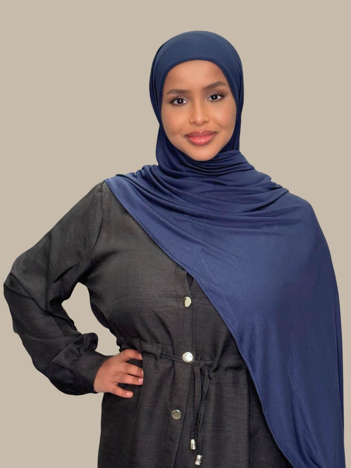 Navy Pre-Sewn Jersey Hijab, on model front view, draped on shoulder