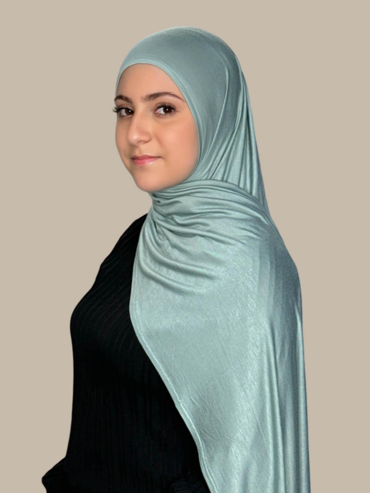 Pale Cyan Pre-Sewn Jersey Hijab in Modish Girl size,side view on model with hijab draped over shoulder showing smooth fit and soft stretch