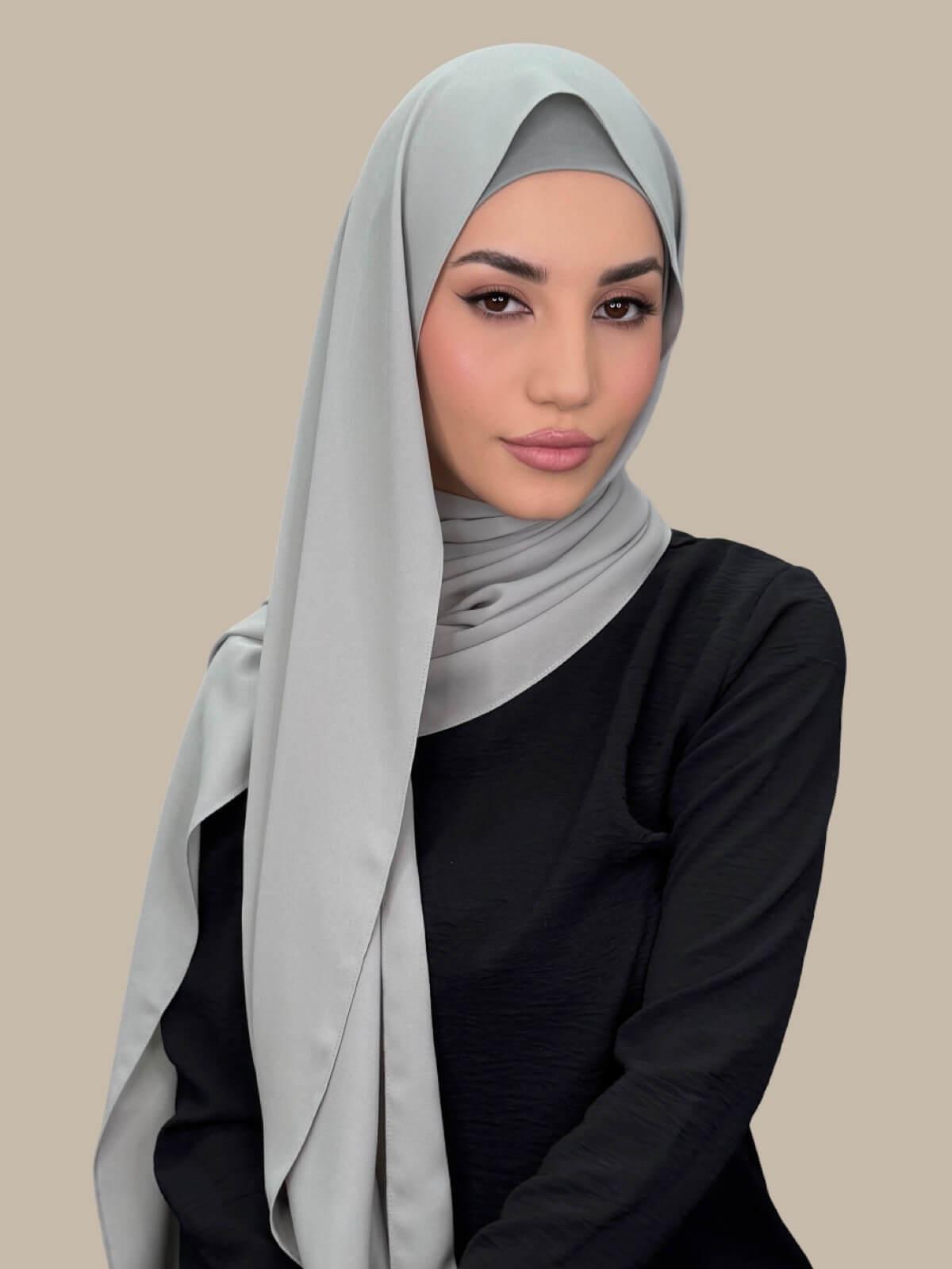 Soft Sage Matching Chiffon Hijab Set on model, front view showing lightweight drape and smooth layered wrap with elegant finish.