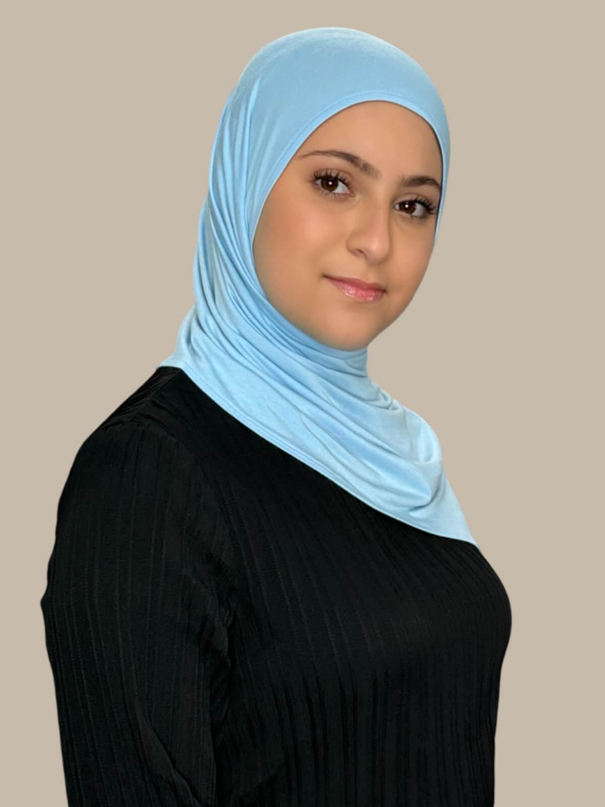 Baby Blue Pre-Sewn Jersey Hijab in Modish Girl size, side view on model draped over shoulder