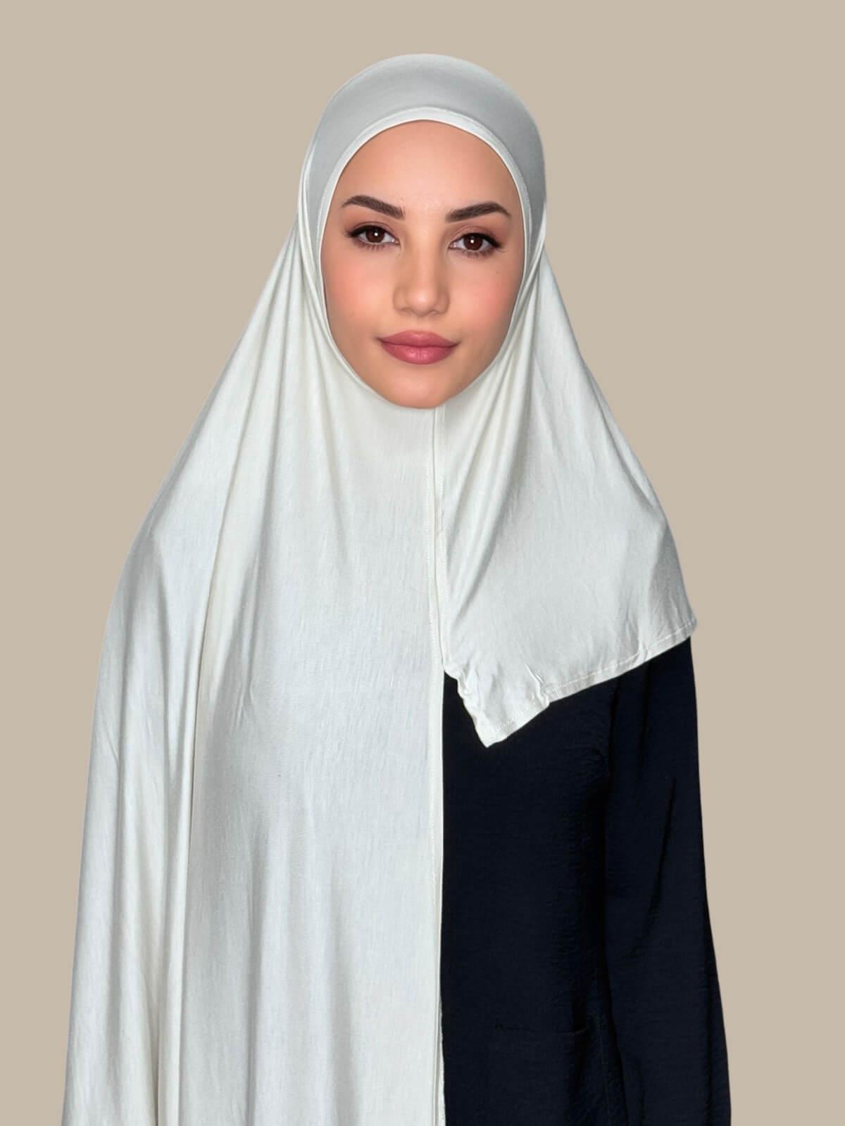 Ivory Pre-Sewn Jersey Hijab front view on model showing full coverage and smooth drape on both sides.