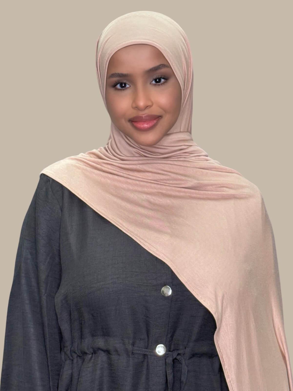 Warm Taupe Pre-Sewn Jersey Hijab, front view on model draped over the shoulder