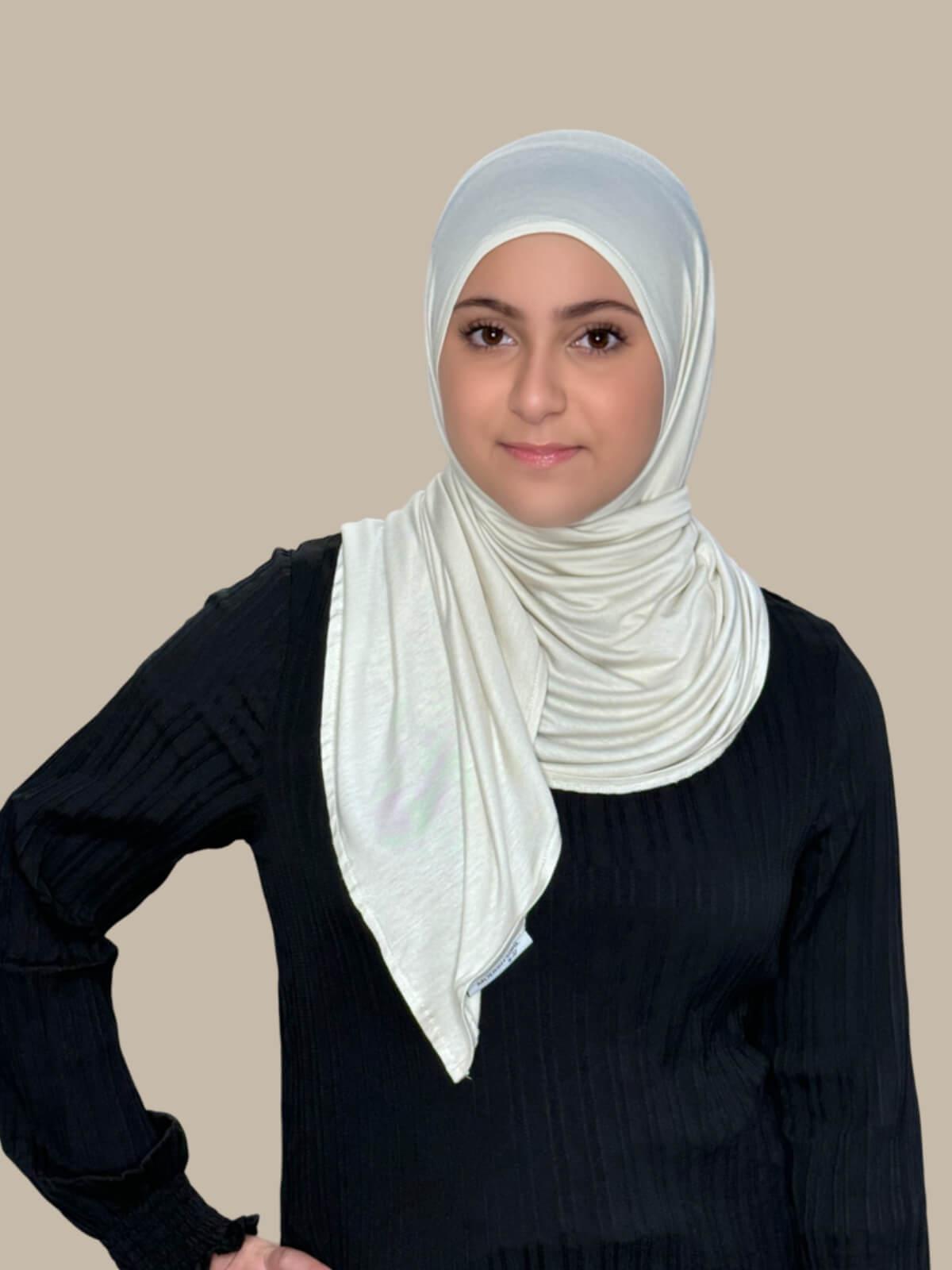 Ivory Pre-Sewn Jersey Hijab in Modish Girl size, front view on model with hijab wrapped neatly around shoulders showing smooth fit and soft stretch fabric.