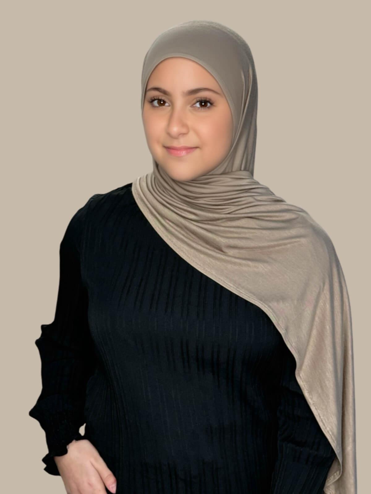 Desert Pre-Sewn Jersey Hijab in Modish Girl size, front view on model with hijab draped over shoulder showing smooth fit and soft stretch fabric.