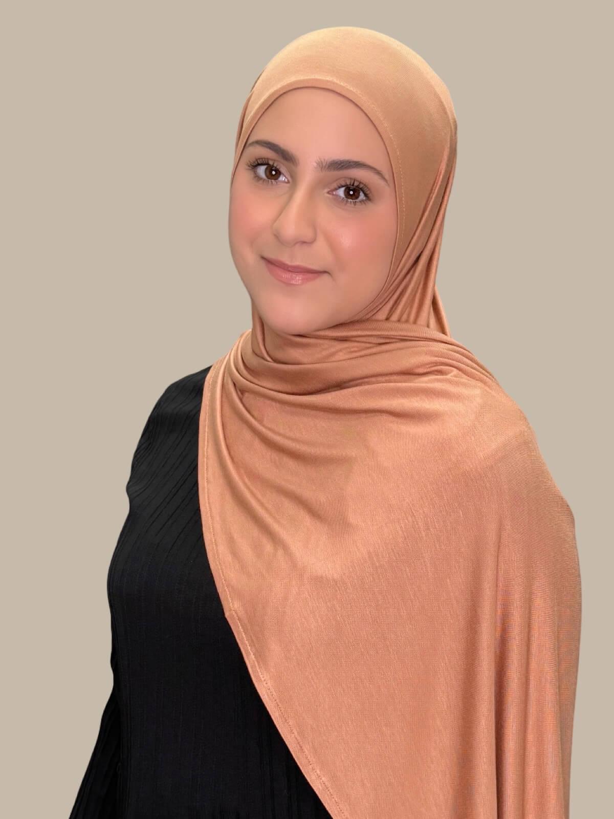 Sahara Pre-Sewn Jersey Hijab in Modish Girl size, front view on model with hijab draped over shoulder
