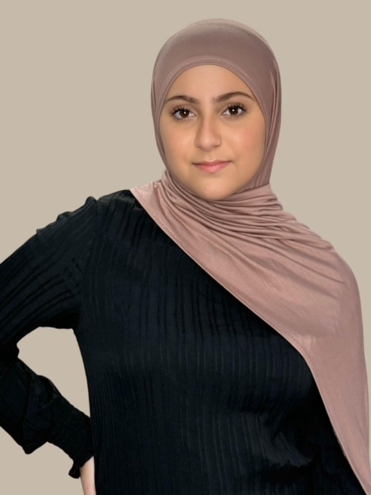 Pale Taupe Pre-Sewn Jersey Hijab in Modish Girl size, front view on model with hijab draped over shoulder
