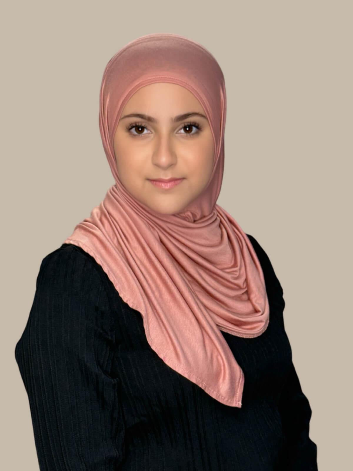 Wood Rose Pre-Sewn Jersey Hijab in Modish Girl size, front view on model with hijab wrapped neatly around shoulders showing smooth fit and soft stretch fabric. No pins effortless