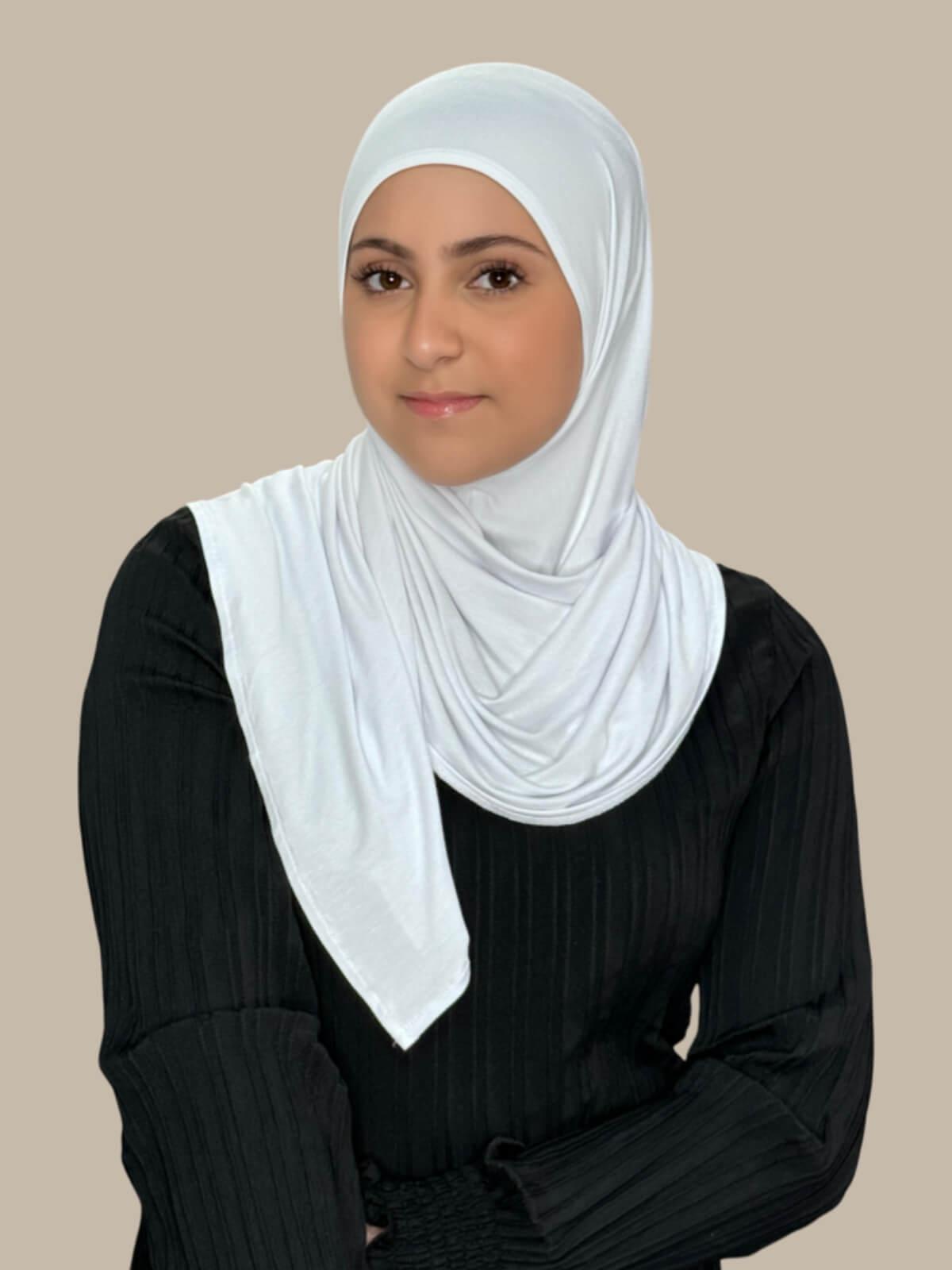 White Pre-Sewn Jersey Hijab in Modish Girl size, front view on model with hijab wrapped neatly around shoulders, no pins