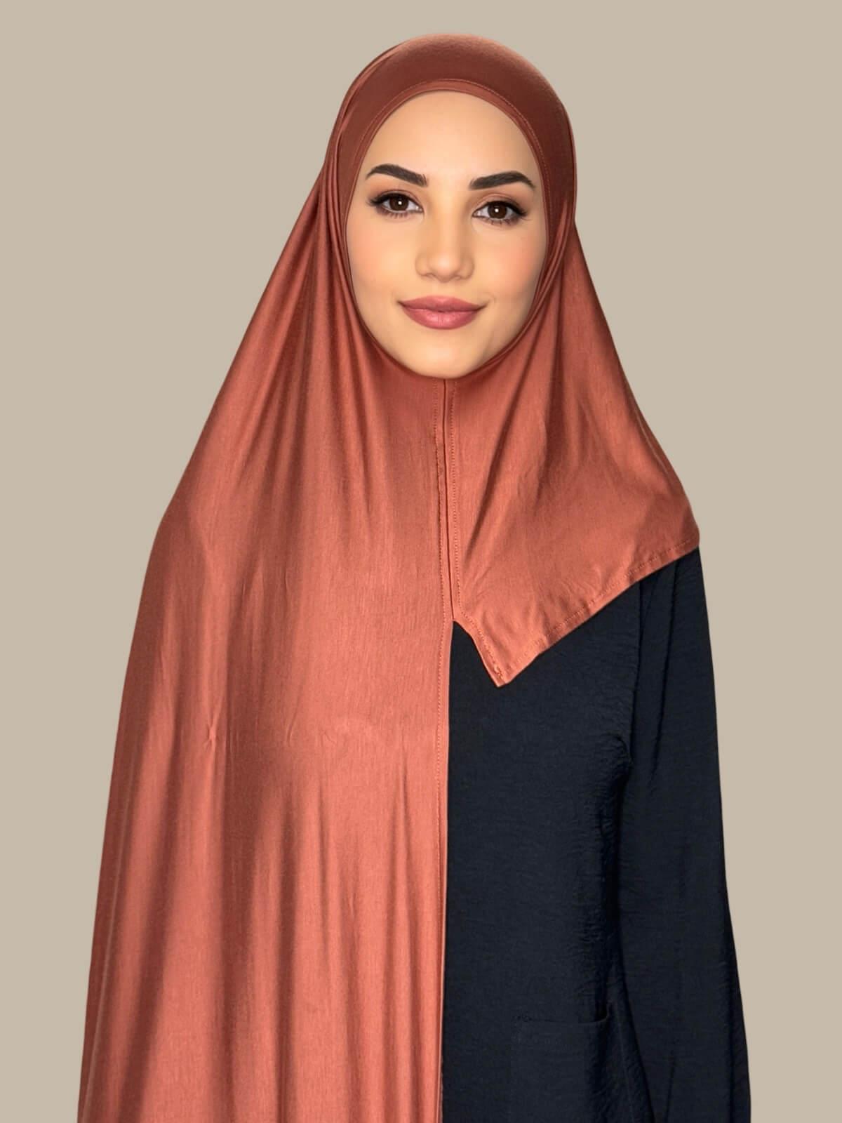 Brick Red Pre-Sewn Jersey Hijab front view on model showing full coverage and smooth drape on both sides