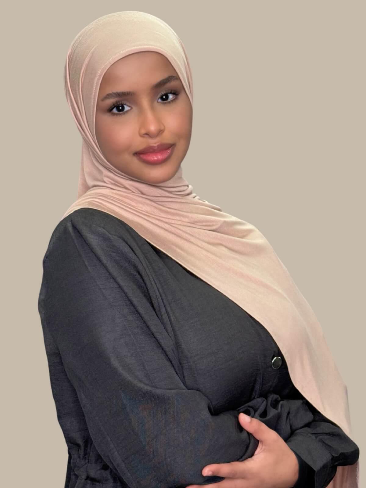 Warm Taupe Pre-Sewn Jersey Hijab, side view on model draped over the shoulder