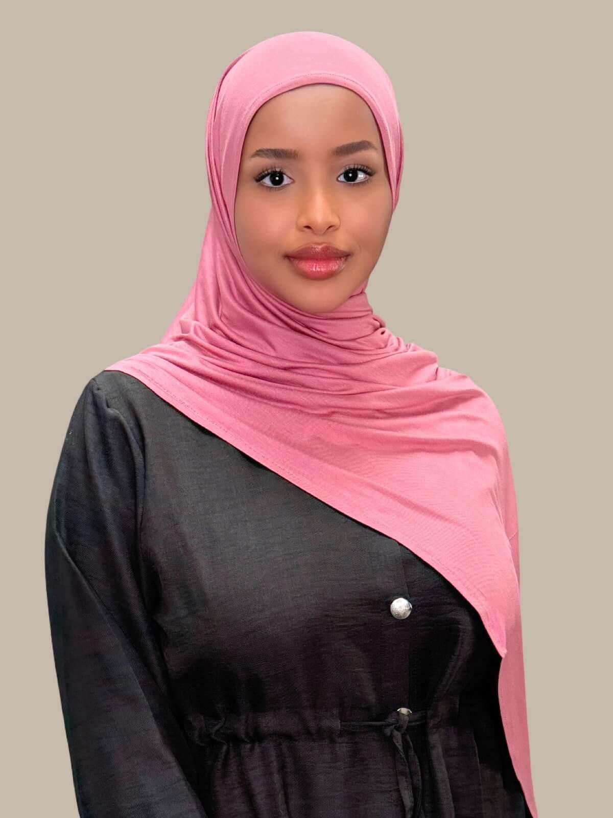 Pale Rose Pre-SEwn Jersey Hijab front view on model draped over shoulder