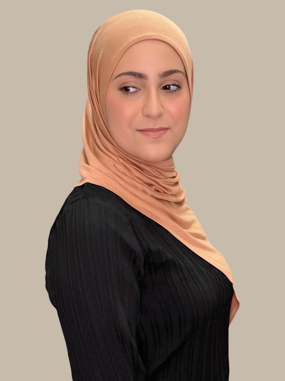 Sahara Pre-Sewn Jersey Hijab in Modish Girl size, side view on model with hijab draped over shoulder 