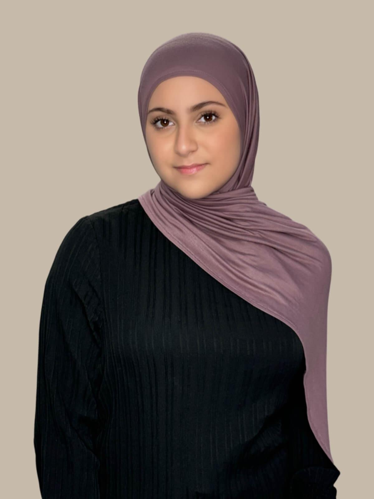 Rose Taupe Pre-Sewn Jersey Hijab in Modish Girl size, front view on model with hijab draped over shoulder showing smooth fit and soft stretch 