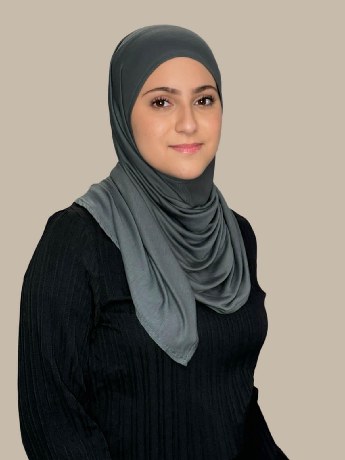 Pebble Grey Pre-Sewn Jersey Hijab in Modish Girl size, side view on model with hijab wrapped neatly around shoulders showing smooth fit and soft stretch fabric. No pins effortless