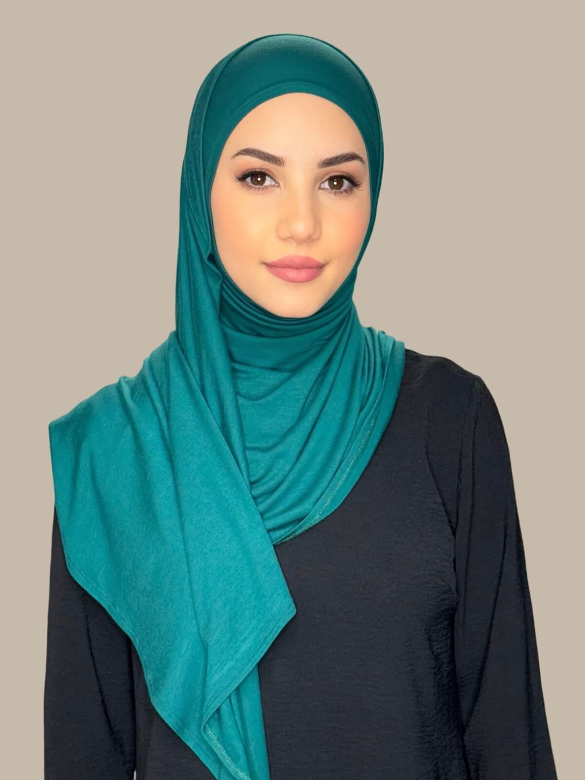 Pine Green Pre-Sewn Jersey Hijab,front view on model