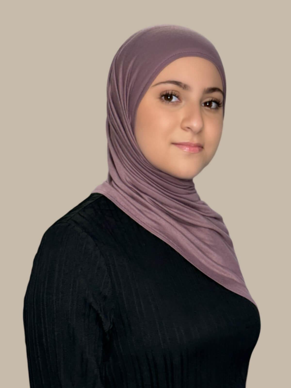 Rose Taupe Pre-Sewn Jersey Hijab in Modish Girl size, side view on model with hijab draped over shoulder 