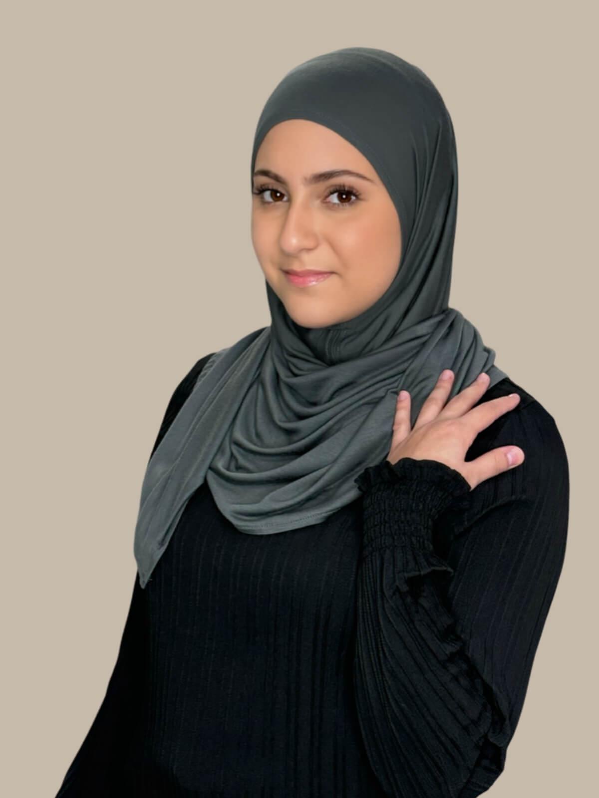Pebble Grey Pre-Sewn Jersey Hijab in Modish Girl size, side view on model with hijab wrapped neatly around shoulders showing smooth fit and soft stretch fabric.