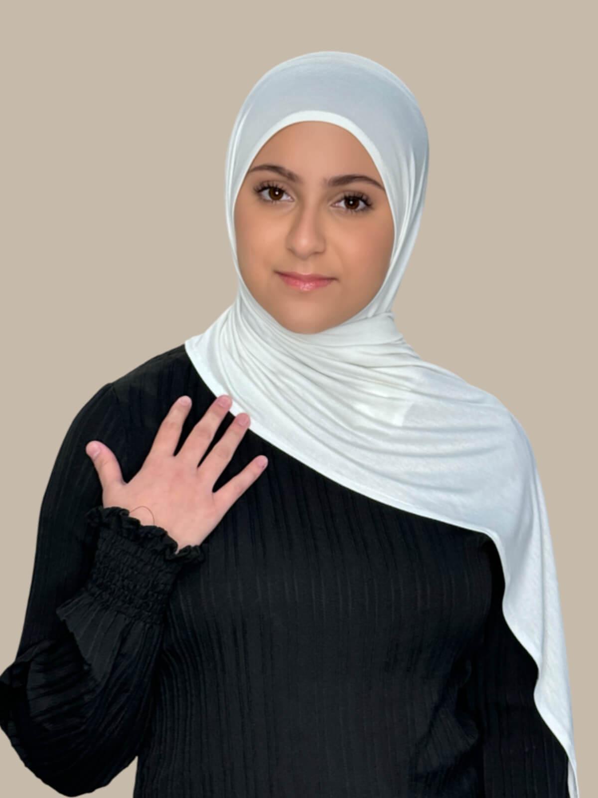 Off White Pre-Sewn Jersey Hijab in Modish Girl size, front view on model with hijab draped over shoulder 