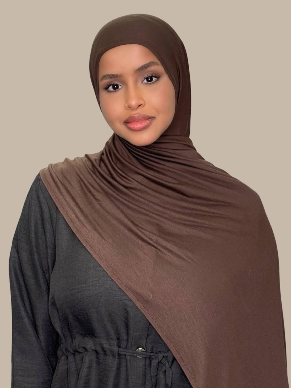 Chocolate Brown Pre-Sewn Jersey Hijab, front view on model, draped over the shoulder